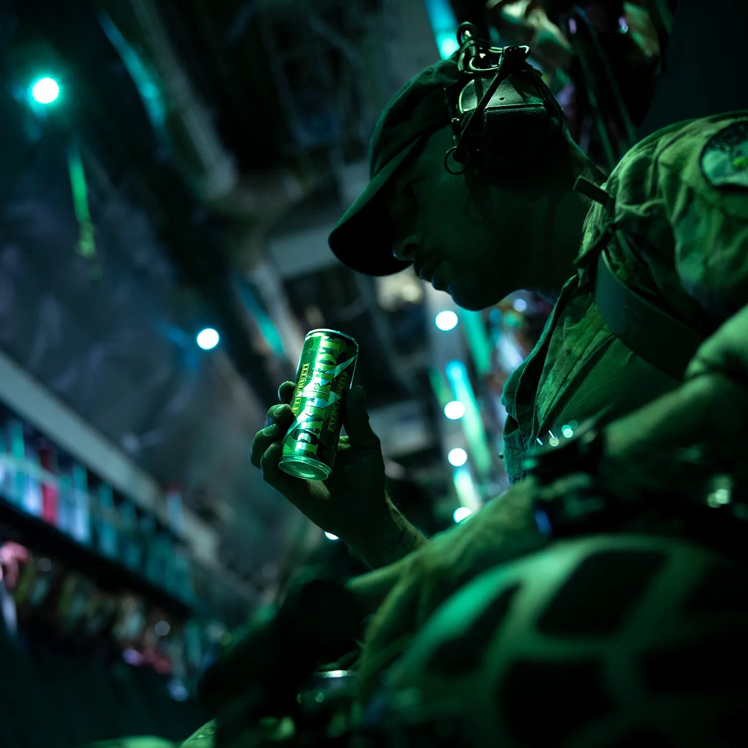 image of military person drinking Patriot energy drink on a mission